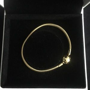 Golden Pandora bracelet. Brand New.